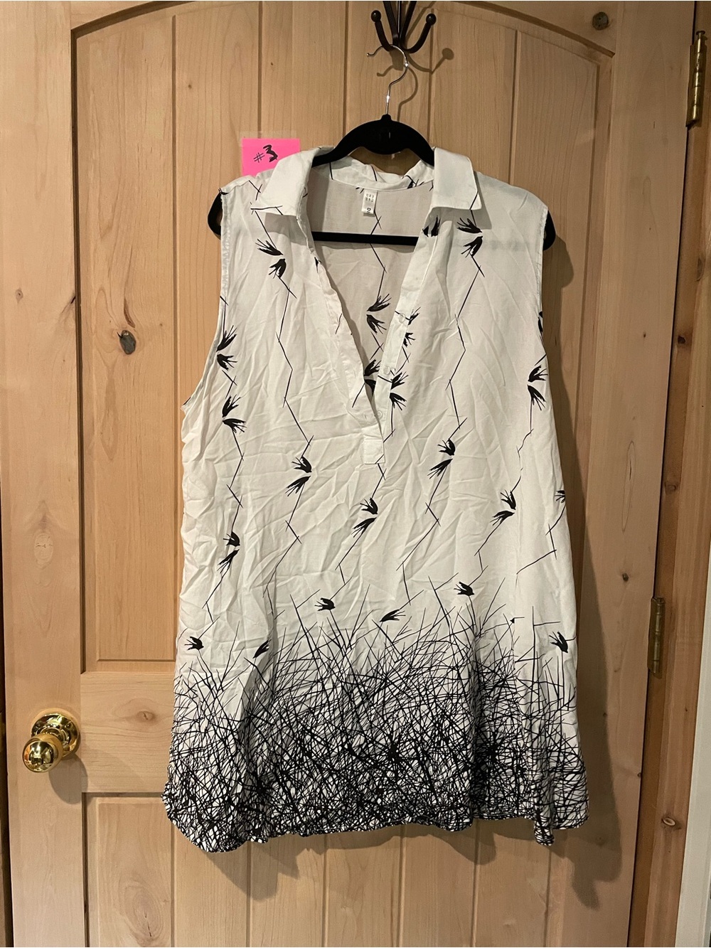 Sleeveless White & Black Printed V-Neck Tunic